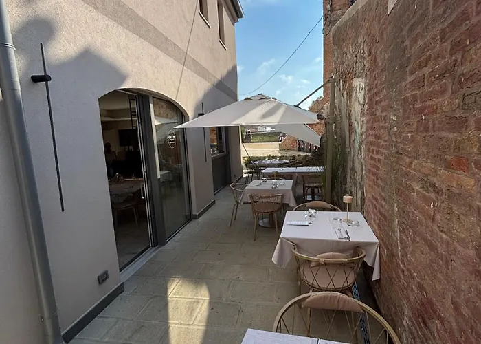 ベッド・アンド・ブレックファスト Osteria Tripunt コマッキオ